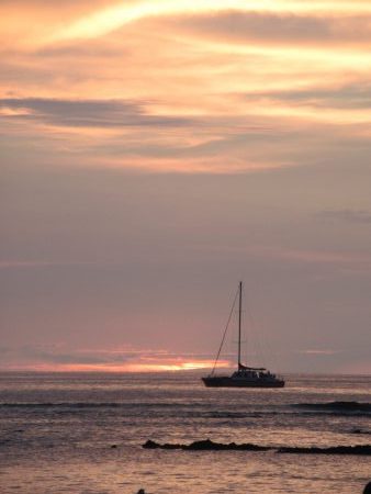 Sunset with the catamaran than provides the sunset cruise.