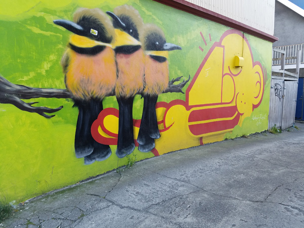 Birds on a wall.