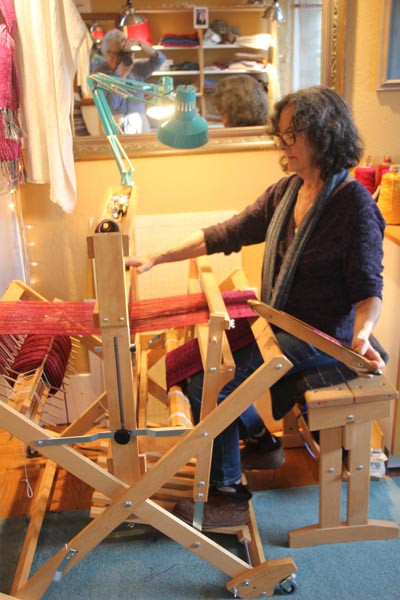 Abby at her loom.