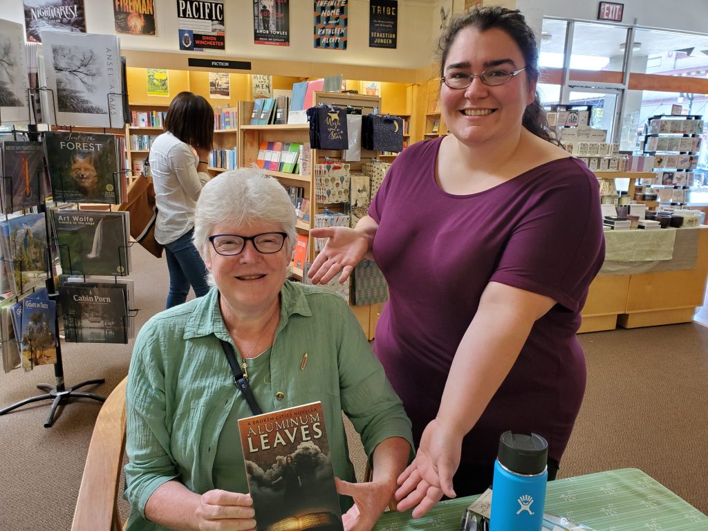 (Standing) Amber from Copperfields Petaluma and me, with the book