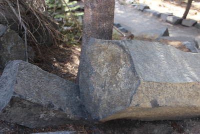 The base of a broken pillar, hexagonal, about 12 inches across.